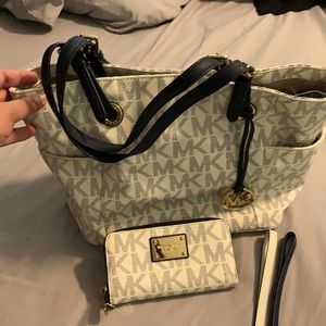 Authentic Michael Kors monogram medium bag and wallet.